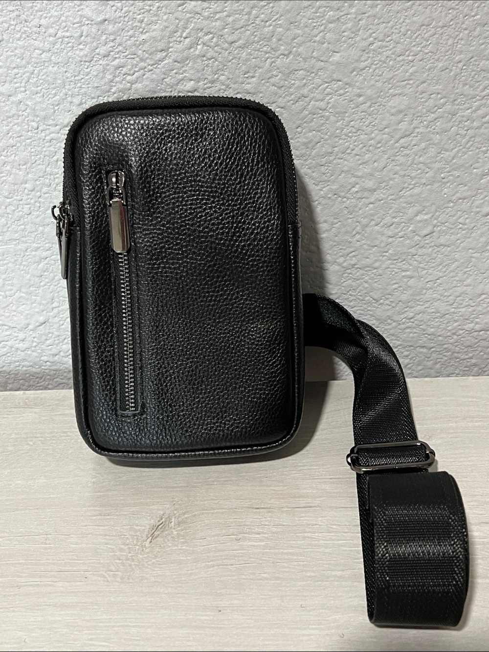 I have 2 Black Leather Crossbody Sling Bag for Men.(1) brand INICAT new with tag